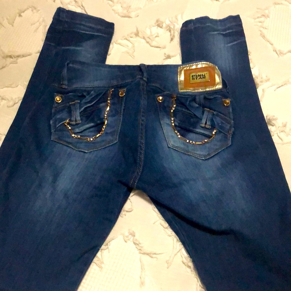 Size 1 pink star going out jeans.